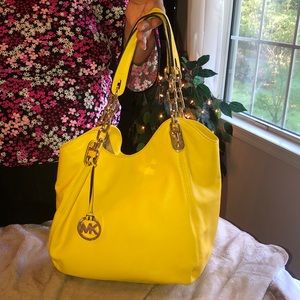 Micheal Khors new awesome yellow purse!!!